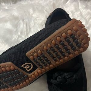 Rothy's Black and Brown Boat Shoes